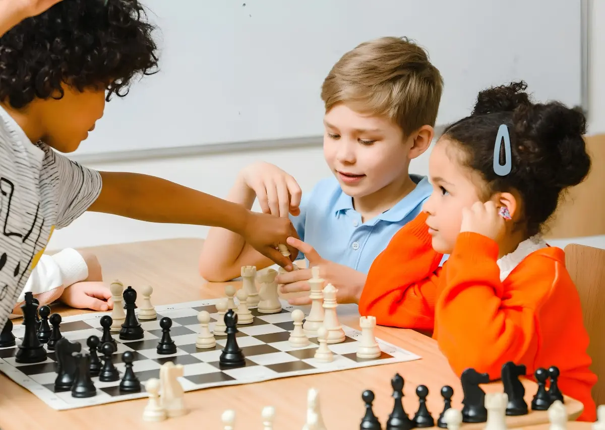 Students developing chess skills through GrittyTech online classes.